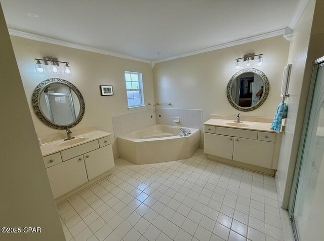 full bathroom with tile patterned floors, a sink, and ornamental molding