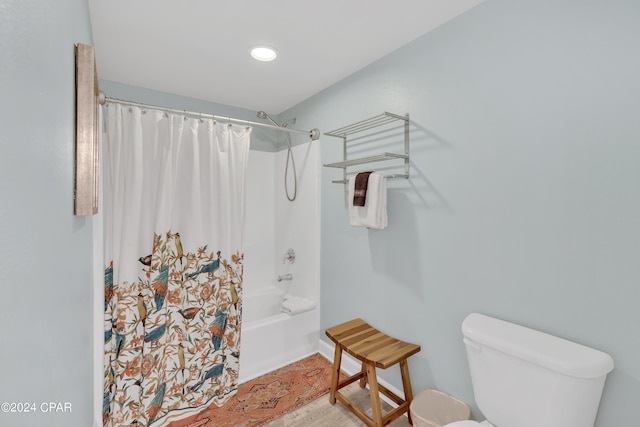 full bathroom with recessed lighting, toilet, and shower / bathtub combination with curtain