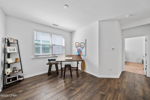 8453 Landshark Blvd, Panama City Beach, FL 32413 - dining space with visible vents, baseboards, and wood finished floors