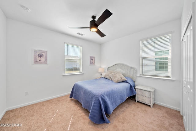 8453 Landshark Blvd, Panama City Beach, FL 32413 - bedroom with a closet, baseboards, visible vents, and carpet floors