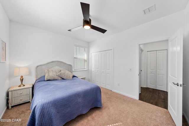 8453 Landshark Blvd, Panama City Beach, FL 32413 - carpeted bedroom featuring visible vents, baseboards, a ceiling fan, and a closet