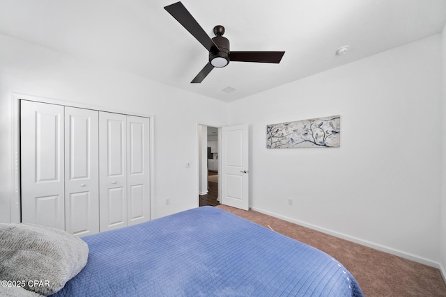 8453 Landshark Blvd, Panama City Beach, FL 32413 - carpeted bedroom featuring a closet, baseboards, and ceiling fan