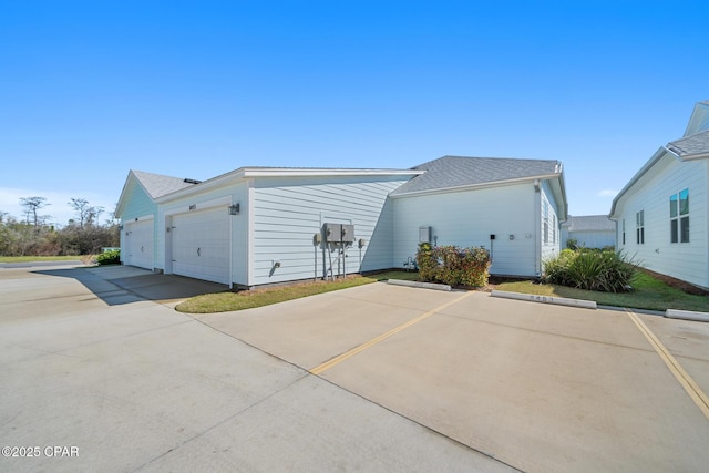 8453 Landshark Blvd, Panama City Beach, FL 32413 - view of side of property with uncovered parking
