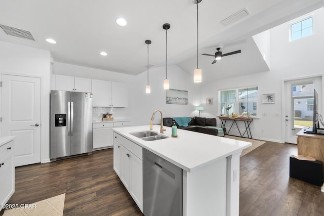 8453 Landshark Blvd, Panama City Beach, FL 32413 - kitchen featuring a sink, visible vents, open floor plan, and appliances with stainless steel finishes