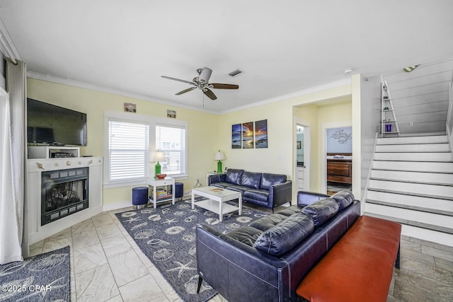 123 Sapodilla Ln, Port St Joe, FL 32456 - living room featuring crown molding, ceiling fan, stairway, a fireplace, and marble finish flooring