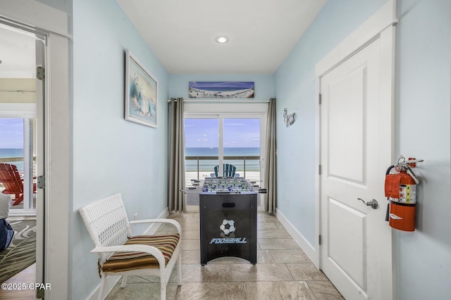 123 Sapodilla Ln, Port St Joe, FL 32456 - dining space with a water view, baseboards, recessed lighting, and light tile patterned floors