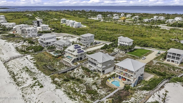 123 Sapodilla Ln, Port St Joe, FL 32456 - bird's eye view of a nearby body of water and a pool area