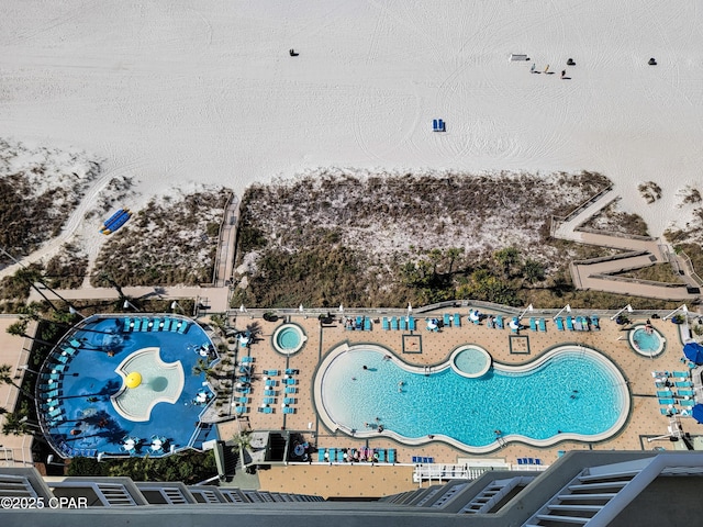 drone / aerial view of a pool area