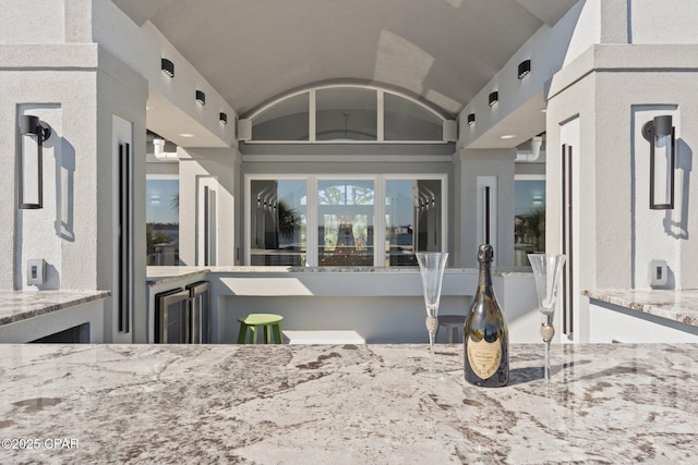4522 Bay Point Rd, Panama City Beach, FL 32408 - exterior space featuring vaulted ceiling and light stone countertops