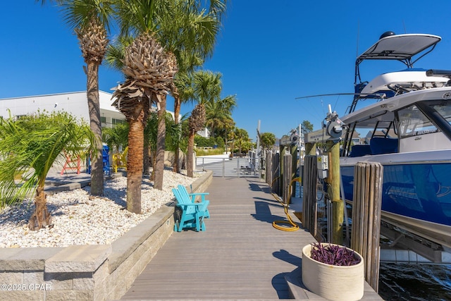 4522 Bay Point Rd, Panama City Beach, FL 32408 - surrounding community with boat lift and a boat dock