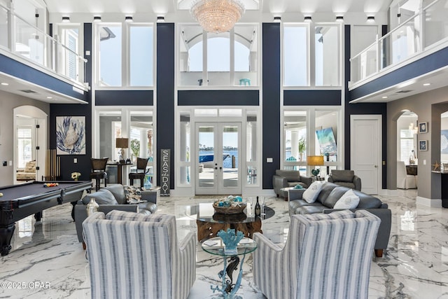 4522 Bay Point Rd, Panama City Beach, FL 32408 - living area with marble finish floor, arched walkways, and billiards