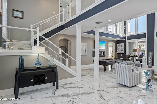 4522 Bay Point Rd, Panama City Beach, FL 32408 - interior space with marble finish floor, arched walkways, billiards, and visible vents
