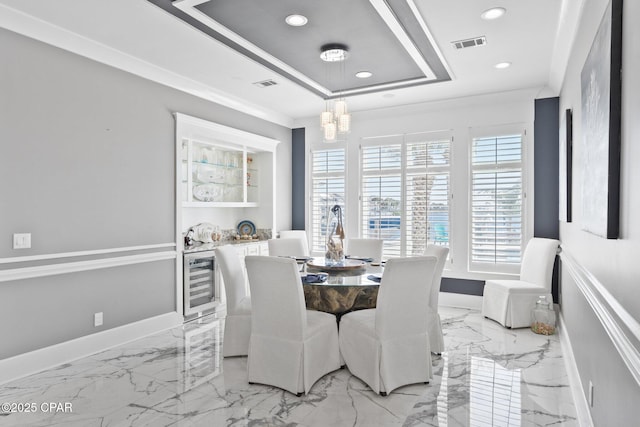 4522 Bay Point Rd, Panama City Beach, FL 32408 - dining room featuring baseboards, visible vents, an inviting chandelier, and a raised ceiling