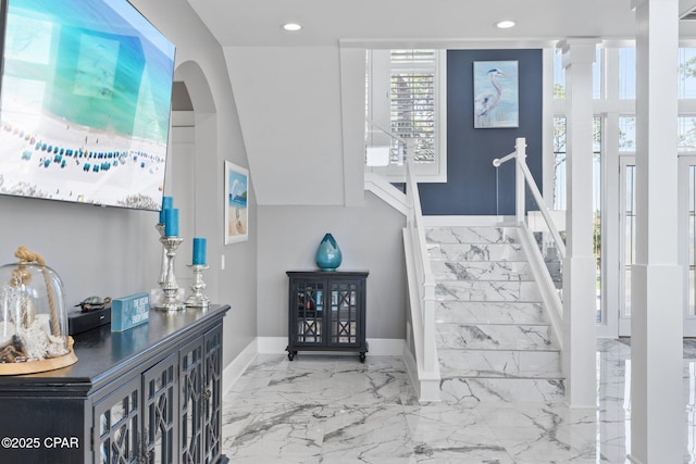 4522 Bay Point Rd, Panama City Beach, FL 32408 - stairs featuring marble finish floor, arched walkways, baseboards, and recessed lighting