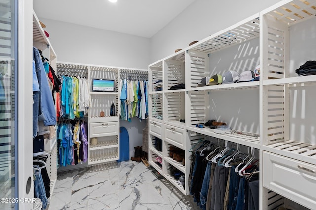 4522 Bay Point Rd, Panama City Beach, FL 32408 - walk in closet featuring marble finish floor