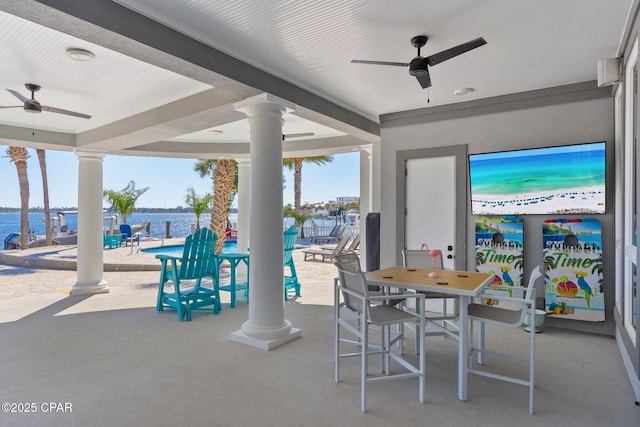 4522 Bay Point Rd, Panama City Beach, FL 32408 - view of patio / terrace with outdoor dining space and a water view
