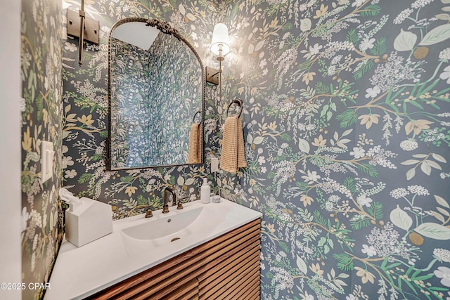 7603 Coastal Hammock Trl, Panama City Beach, FL 32413 - bathroom with wallpapered walls and vanity