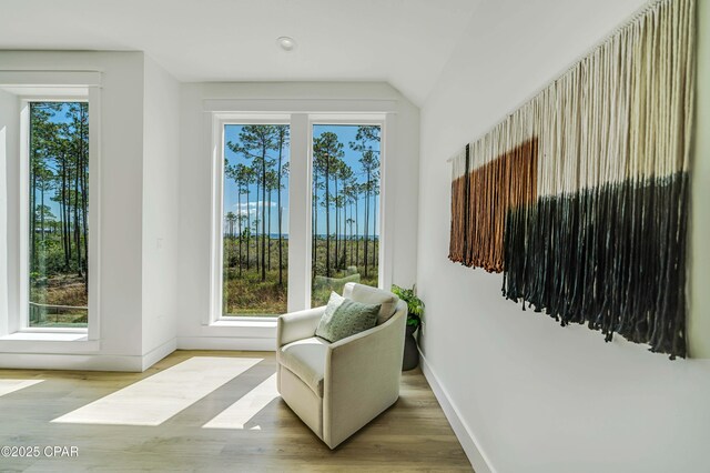 7603 Coastal Hammock Trl, Panama City Beach, FL 32413 - sitting room with baseboards, wood finished floors, and recessed lighting