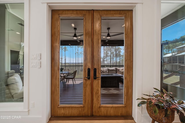 7603 Coastal Hammock Trl, Panama City Beach, FL 32413 - entryway with a ceiling fan, plenty of natural light, and french doors