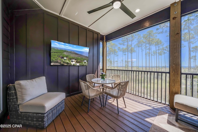 7603 Coastal Hammock Trl, Panama City Beach, FL 32413 - sunroom / solarium with a ceiling fan, healthy amount of natural light, and wood finished floors