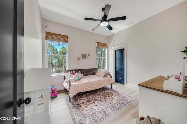 7603 Coastal Hammock Trl, Panama City Beach, FL 32413 - bedroom featuring light wood-style flooring, baseboards, and ceiling fan