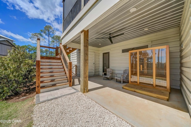 7603 Coastal Hammock Trl, Panama City Beach, FL 32413 - view of patio with stairs and ceiling fan