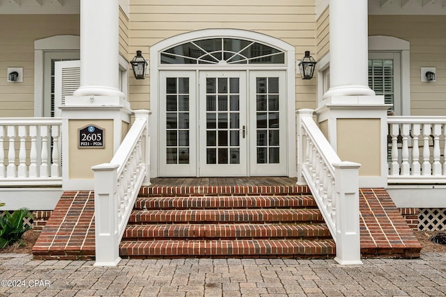property entrance featuring french doors