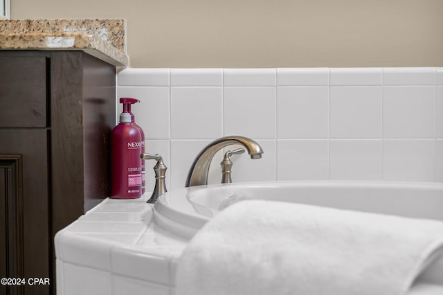 room details featuring a bathing tub