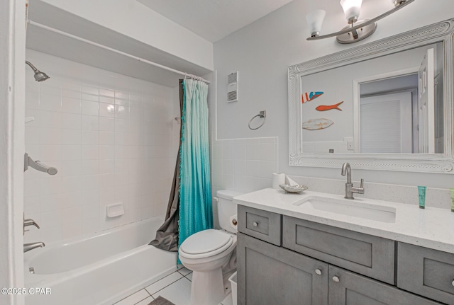 5801 Thomas Dr Unit 919, Panama City Beach, FL 32408 - bathroom with vanity, shower / tub combo, toilet, tile patterned flooring, and visible vents
