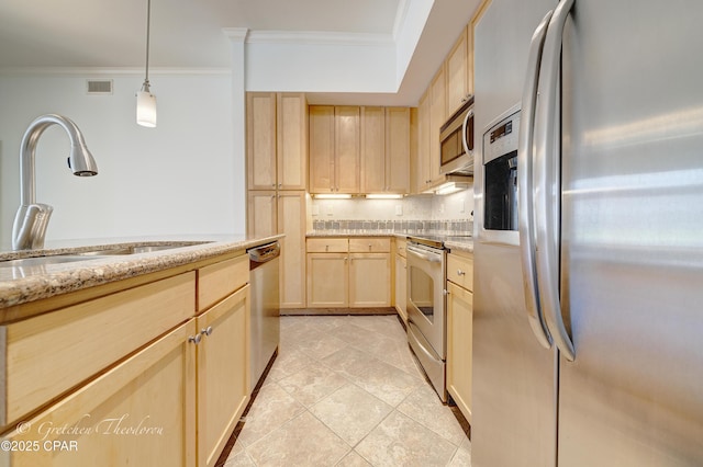 8700 Front Beach Rd Unit 5101, Panama City Beach, FL 32407 - kitchen with appliances with stainless steel finishes, light brown cabinets, a sink, ornamental molding, and tasteful backsplash