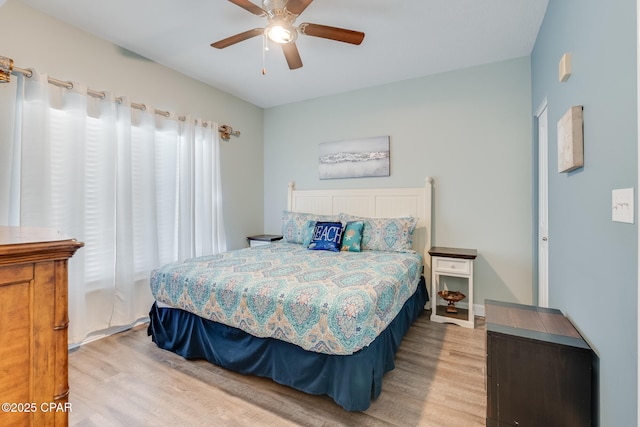 bedroom featuring ceiling fan and wood finished floors