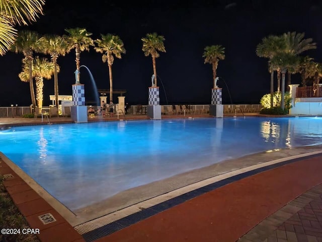 pool at twilight with a community pool