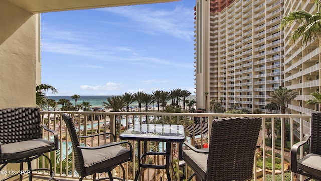 balcony featuring a water view