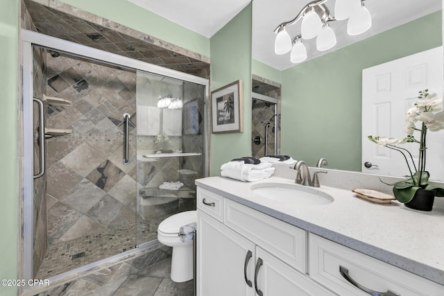 5801 Thomas Dr Unit 1216, Panama City Beach, FL 32408 - full bathroom featuring vanity, toilet, and a shower stall