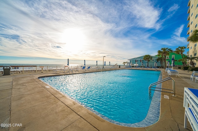 5801 Thomas Dr Unit 1216, Panama City Beach, FL 32408 - pool featuring a patio and fence