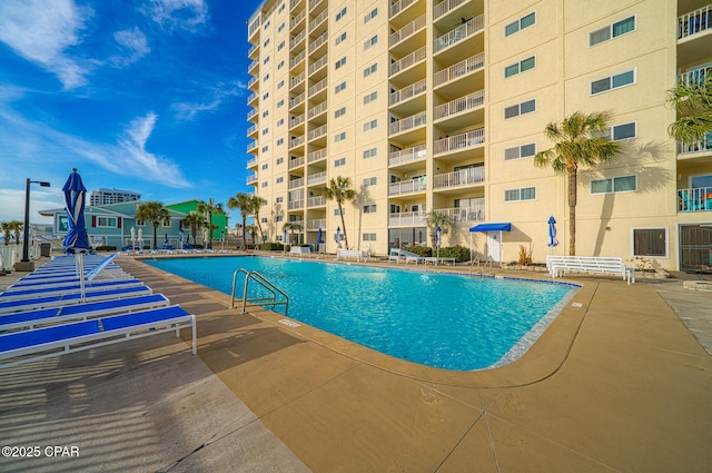 5801 Thomas Dr Unit 1216, Panama City Beach, FL 32408 - community pool with a patio