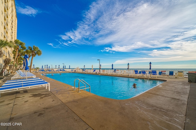 5801 Thomas Dr Unit 1216, Panama City Beach, FL 32408 - community pool featuring a patio area