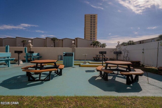 8743 Thomas Dr Unit 1328, Panama City, FL 32408 - view of community featuring a patio and fence
