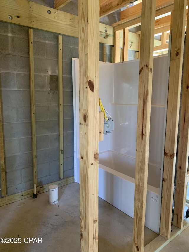 bathroom featuring concrete floors