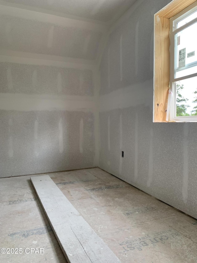 additional living space featuring plenty of natural light