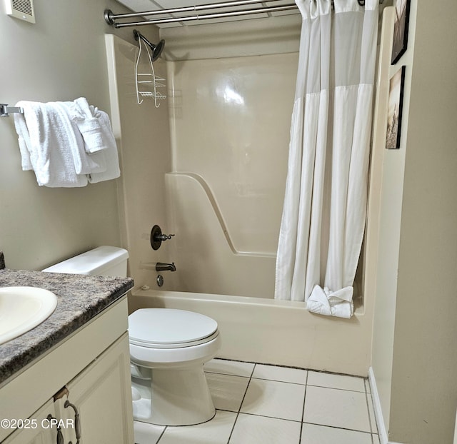 bathroom featuring shower / tub combo, tile patterned floors, vanity, and toilet