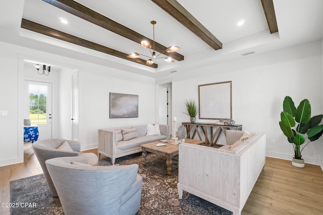 1709 White Western Lake Ln, Panama City, FL 32409 - living room with a chandelier, beamed ceiling, and wood finished floors