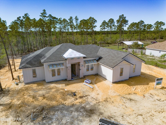 1709 White Western Lake Ln, Panama City, FL 32409 - modern farmhouse featuring a shingled roof