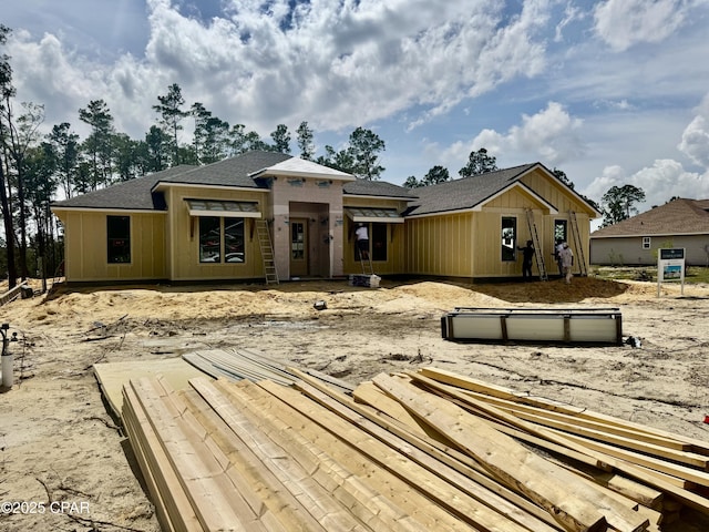 1709 White Western Lake Ln, Panama City, FL 32409 - back of house featuring roof with shingles