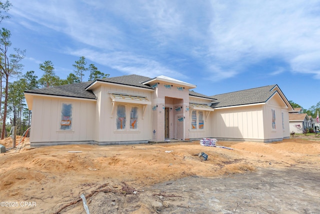 1709 White Western Lake Ln, Panama City, FL 32409 - view of front of property with a shingled roof and board and batten siding