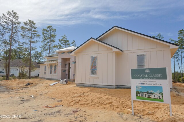 1709 White Western Lake Ln, Panama City, FL 32409 - view of front of home featuring board and batten siding