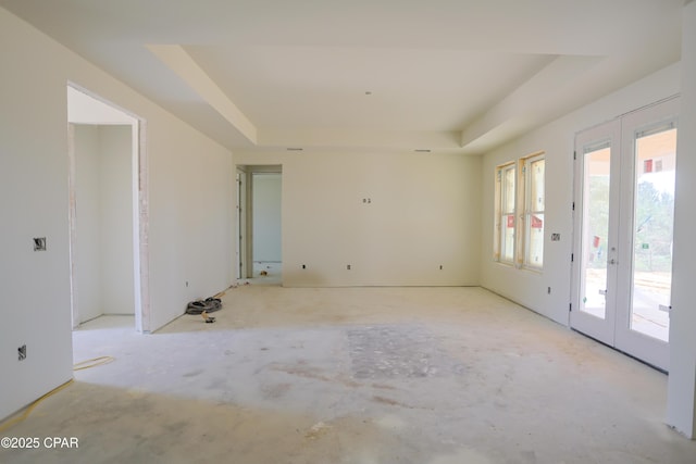 1709 White Western Lake Ln, Panama City, FL 32409 - spare room featuring a tray ceiling and french doors