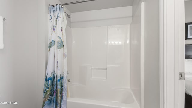 9900 S Thomas Dr Unit 1719, Panama City Beach, FL 32408 - bathroom with shower / bath combination with curtain
