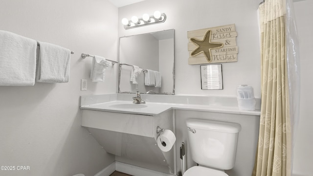 9900 S Thomas Dr Unit 1719, Panama City Beach, FL 32408 - bathroom featuring toilet and vanity