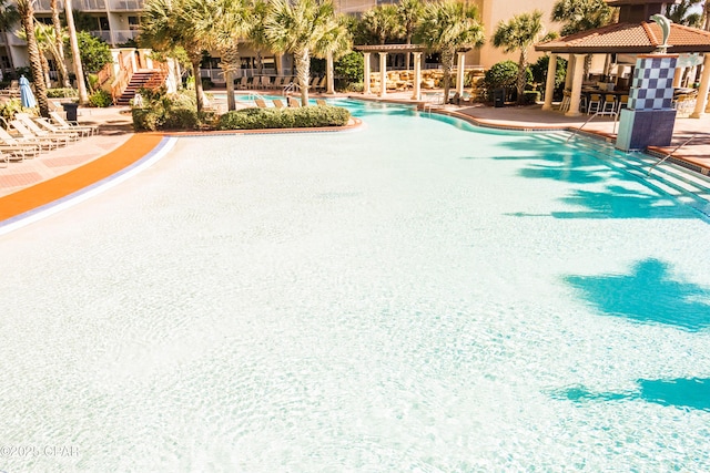 9900 S Thomas Dr Unit 1719, Panama City Beach, FL 32408 - community pool with a gazebo and a patio area